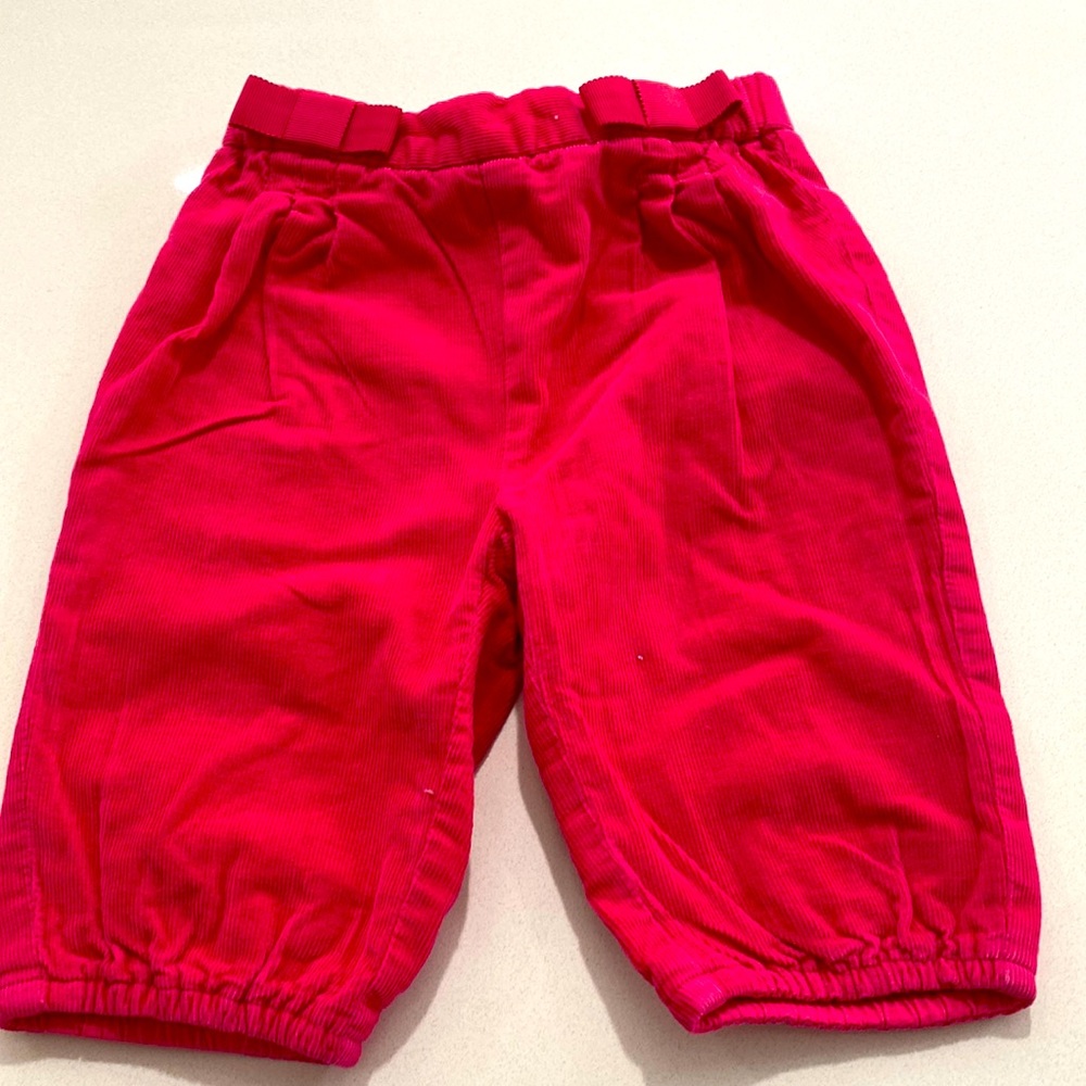 Jacadi pink corduroy pull on pants with bows. 6 months. Perfect condition.